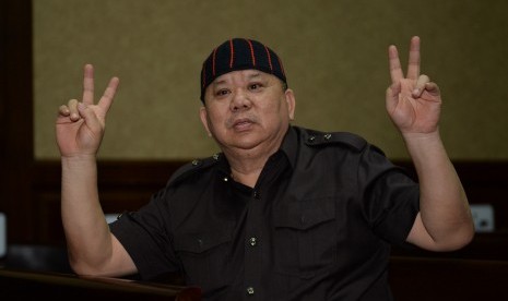 Terdakwa kasus suap pemberian izin lokasi perkebunan di Kutai Kartanegara Heri Sutanto Gun bersiap mengikuti sidang perdana di Pengadilan Tipikor, Jakarta, Rabu (7/3). 