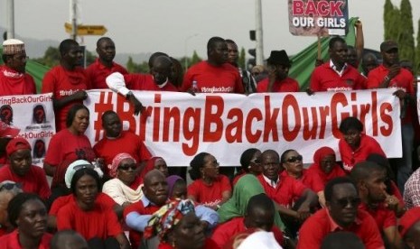 The Abuja wing of the 'Bring Back Our Girls' protest group prepare to march to the presidential villa on May 22, 2014.