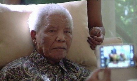 The ailing anti-apartheid icon Nelson Madela is filmed last April. The office of South Africa's president said Saturday, June 8, 2013 that Mandela has been taken to a hospital because of a lung infection. 