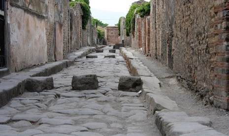 The blocks in the road allowed pedestrians to cross the street without having to step onto the road itself which doubled up as Pompeii's drainage and sewage disposal system. (file photo)