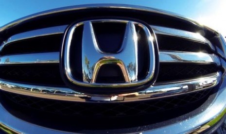 The front grill of a Honda truck is shown on car lot in Carlsbad, California November 5, 2014.