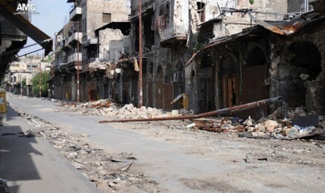 This citizen journalism image provided by Aleppo Media Center AMC which has been authenticated based on its contents and other AP reporting, shows damaged buildings during battles between the rebels and the Syrian government forces, in Aleppo, Syria, Thurs