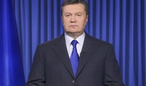 This Feb. 19, 2014, file photo shows Ukrainian President Viktor Yanukovych addressing the nation on a live TV broadcast in Kiev, Ukraine. 