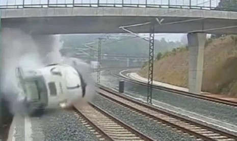 This image taken from security camera video shows a train dreailing in Santiago de Compostela, Spain, on Wednesday. 