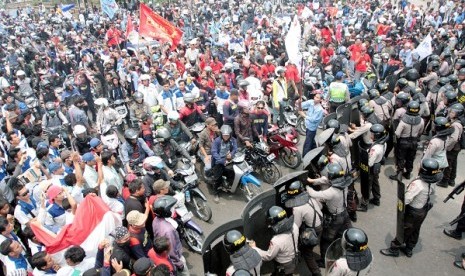 Thousands workers hold a protest to demand better life. (illustration)  