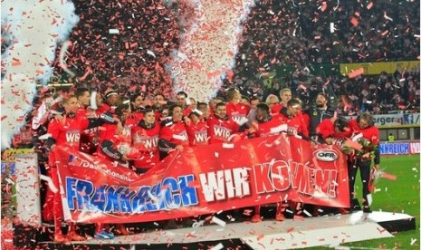 Timnas Austria merayakan keerhasilan lolos ke putaran final Piala Eropa 2016