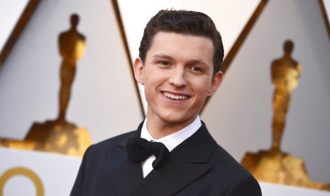 Aktor Tom Holland. Film kolaborasi Tom Holland dan Christopher Nolan yang akan digarap pada 2024 diprediksi bakal lebih menarik daripada film James Bond.