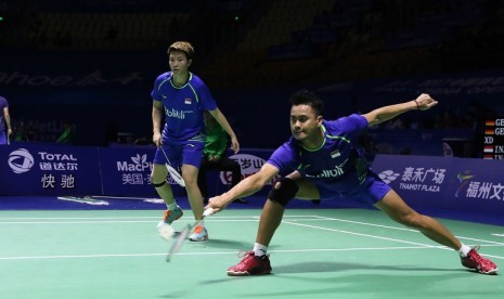 Tontowi Ahmad (kanan) dan Liliyana Natsir.