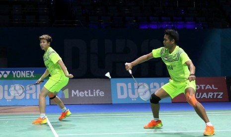 Tontowi Ahmad (kanan) dan Liliyana Natsir.