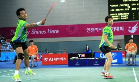 Tontowi Ahmad (kiri) dan Liliyana Natsir.