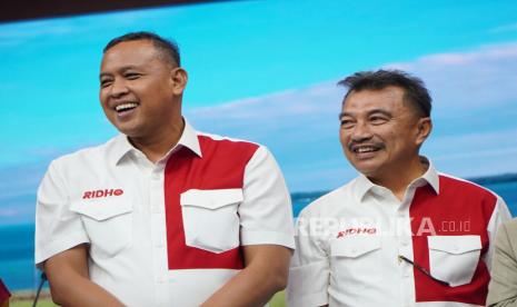 Tri Adhianto dan Haris Bobihoe.