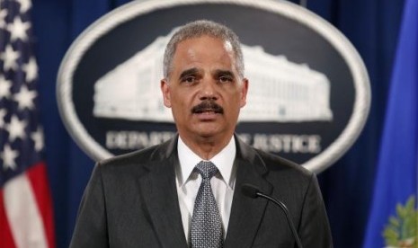 U.S. Attorney General Eric Holder makes a statement about the grand jury decision not to seek an indictment in the Staten Island death of Eric Garner during an arrest in July, in Washington December 3, 2014.