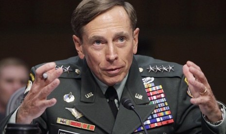 U.S. General David Petraeus gestures during the Senate Intelligence Committee hearing on his nomination to be director of the Central Intelligence Agency on Capitol Hill in Washington in this June 23, 2011. (file photo)  