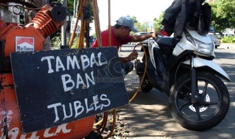 Tukang tambal ban 