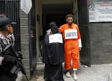 Umar Patek menjalani rekonstruksi di tujuh titik di sekitar kota Jakarta setelah sebelumnya menjalani rekonstruksi di Pandeglang Banten, Solo Jawa Tengah dan Bali. (ANTARA/Widodo)