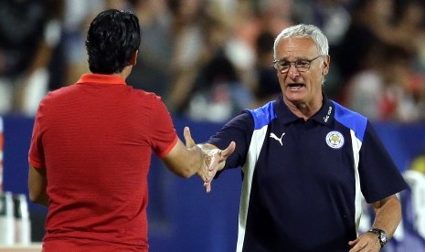 Unai Emery (kiri) dan Claudio Ranieri (kanan)