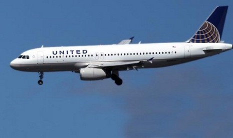 United Airlines flight makes an emergency landing at Dulles Washington International Airport and escorted by a military jet after a male passenger got up in the middle of the aisle and began to pray on Thursday.  