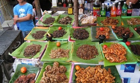 United Nations Food and Agriculture Organization (FAO) shows insects for sale at a market in Chiang Mai, Thailand. 