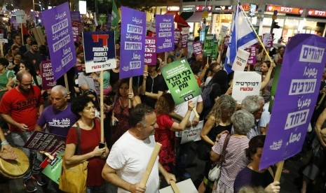 Unjuk rasa yang menentang adanya rencana UU Negara Bangsa Yahudi yang digelar di Tel Aviv beberapa waktu lalu