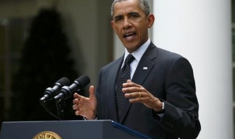 US President Barack Obama delivers an announcement on the number of US troops that will remain in Afghanistan, in the White House Rose Garden in Washington, May 27, 2014.