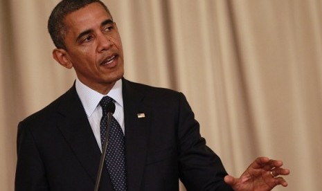 US President Barack Obama speaks during a joint media conference with Thai Prime Minister Yingluck Shinawatra at Government House in Bangkok November 18, 2012. In his first comment on Israel-Palestine crisis, he says