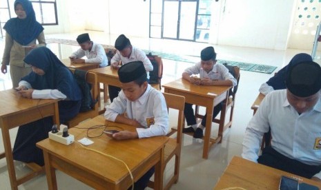 USBN Madrasah di Kabupaten Wajo menggunakan android.