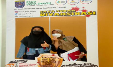 vaksinasi keluarga wartawan oleh PWI Depok