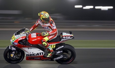 Valentino Rossi saat mengendarai motor Ducati GP12.