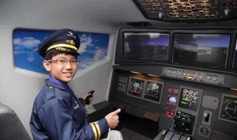 Wahana simulator pesawat Garuda Indonesia di KidZania Jakarta.