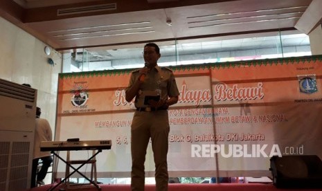 Wakil Gubernur DKI Jakarta Sandiaga Salahuddin Uno membuka Bazaar OK OBE bertema Kreasi Budaya Betawi di Gedung Blok G, Kompleks Balai Kota, Jalan Medan Merdeka Selatan, Jakarta Pusat, Senin (5/3).