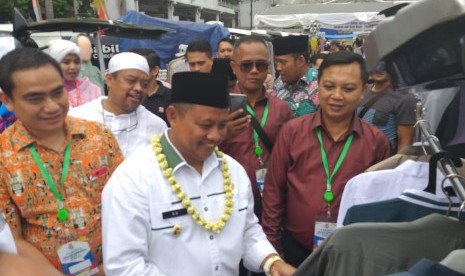 Wakil Gubernur Jawa Barat Uu Ruzhanul Ulum optimis Bandung menjadi kiblat busana muslim.