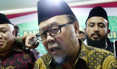 Wakil Ketua Dewan Pertimbangan Majelis Ulama Indonesia (MUI), Didin Hafinuddin (tengah).