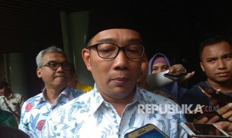  Walikota Bandung Ridwan Kamil usai menghadiri Dialog Terbuka Iluni UI yang diselenggarakan di UI Depok, Kamis (21/12). 