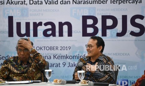 Wamenkeu Mardiasmo (kiri) bersama Dirut BPJS Kesehatan Fahmi Idris menjadi narasumber dalam diskusi Forum Merdeka Barat 9 di kantor Kementerian Kominfo, Jakarta, Senin (7/10/2019).