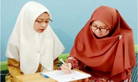 Wanita Asal Filipina Jadi Mualaf di Belait. Foto: April Rose de Guzman Pantajo (kiri)