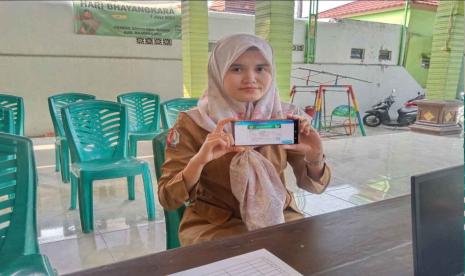 Warga Desa Sroyo, Kecamatan Kanor, Kabupaten Bojonegoro, Jawa Timur, Umy Nurul Hidayah, pengguna layanan BPJS Kesehatan Pekerja Penerima Upah (PPU) Kelas 2.