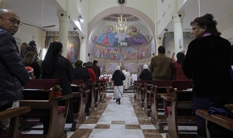 Pelaksanaan natal di Bethlehem dihadiri ribuan wisatawan. Foto ilustrasi Natal di Palestina.