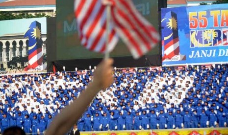 Warga Malaysia merayakan hari kemerdekaan ke-55 yang diselenggarakan di Lapangan Merdeka,Kuala Lumpur,Jumat (31/8).  (Syahruddin El Fikri/Republika)