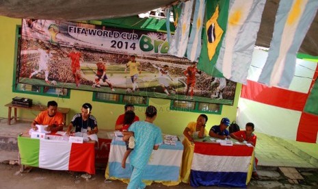 Ballot booths in Madura is decorated with World Cup theme during the presidential election on Wednesday, July 9. 