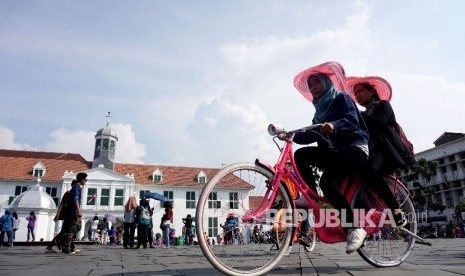 Warga menghabiskan waktu liburan di Kawasan Museum Fatahillah, Kota Tua, Jakarta. (ilustrasi) 