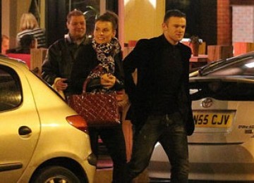 Wayne Rooney dan istri