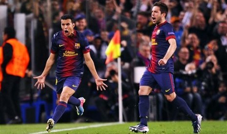 Winger Barcelona, Pedro Rodriguez (kiri) merayakan golnya yang menjadikan skor 1-1 pada laga melawan PSG di Camp Nou pada perempat final leg kedua Liga Champions, Kamis (11/4) dini hari WIB.