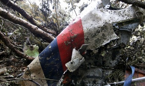 Wreckage of a Sukhoi Super-jet 100 is seen at the crash site on Mount Salak , Bogor, West Java, Indonesia. 