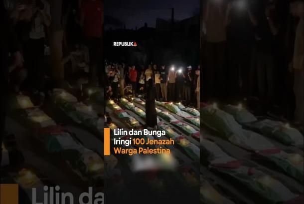 Lilin dan Bunga Iringi 100 Jenazah Warga Palestina