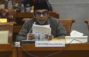 DPR-Menag Sepakat tak Ada Pemotongan Dana BOS Madrasah. Foto ilustrasi: Menteri Agama Fachrul Razi membacakan laporan Kementerian Agama pada rapat kerja dengan Komisi VIII DPR di kompleks Parlemen, Jakarta, Kamis (18/6/2020). Menag Fachrul Razi menyampaikan permintaan maaf kepada Komisi VIII DPR terkait penyampaiannya kepada publik soal pembatalan pemberangkatan Haji 2020