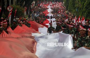 In Picture: Semarak Kirab Merah Putih Sambut HUT Kemerdekaan di Bogor