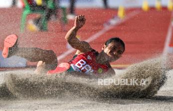 In Picture: Aksi Maria Londa Saat Raih Medali Emas Lompat Jauh PON XXI