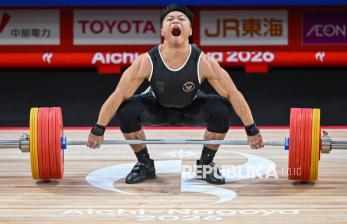 Lifter Rahmat Erwin Ukir Rekor Dunia Saat Rebut Emas Angkat Besi Asian Games