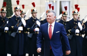 Raja Abdullah dari Yordania saat berada di Istana Elysee, Paris, Prancis.