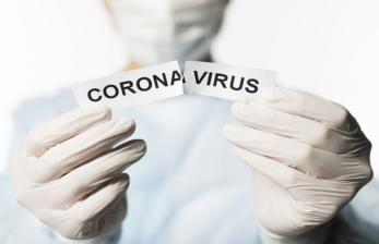Virus corona  (ilustrasi). Dua warga China didakwa meretas data pertahanan hingga riset Covid-19.